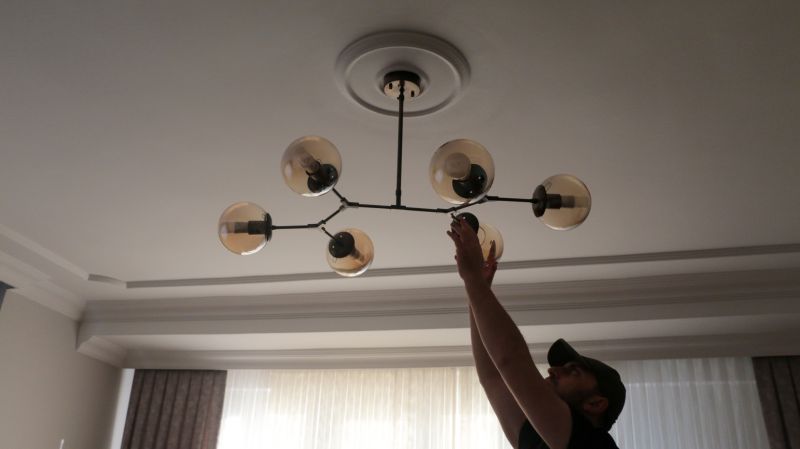 Chandelier Bulb Installation